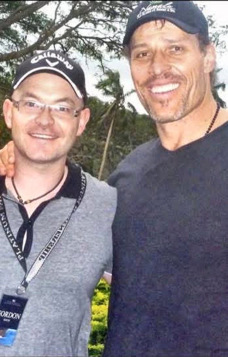 Gordon Smith with Tony Robbins, wearing his Platinum Partnership delegate pass